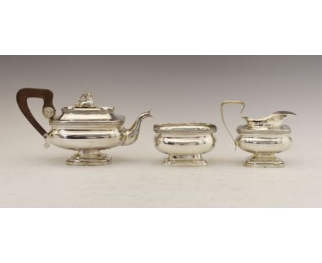 19th/20th Century Dutch silver three piece tea service, the teapot and cream jug bearing the marks of J.M. van Kempen, 1841, 