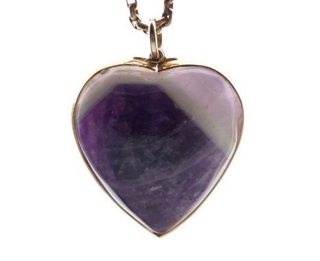 9ct gold large amethyst heart pendant, 3.2cm long, on a chain, 44cm long  Condition: The stone with a chip to the centre appr