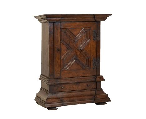 Late 17th Century-style oak table cabinet of inverted breakfront form with geometric moulded door enclosing a shelf, over fri