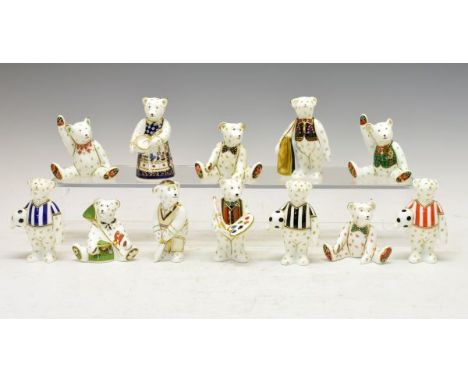 Group of twelve Royal Crown Derby 'mini bear' paperweights, to include; three footballers in differing kits, cricketer, fishe