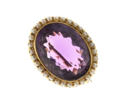 Victorian amethyst and split pearl oval brooch, stamped '15ct', 2.6cm x 2.1cm, 7.6g gross  Condition: Amethyst is clear and b