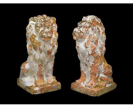 Garden Statuary - Large pair  of terracotta gate finials modelled as seated lions on integral square bases, previously white 