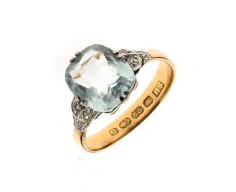 22ct gold aquamarine ring, the rectangular cut measuring approximately 10mm x 7.5mm x 5.6mm deep, with trios of colourless st