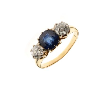 Sapphire and diamond three stone ring, indistinct mark, the cushion shaped sapphire measuring approximately 6.3mm x 6mm x 3.9