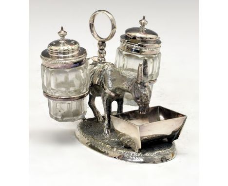 Silver plated figural condiment set formed as a donkey drinking from a trough, its saddle supporting the pepperette and musta