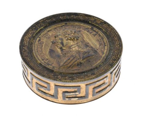 George III circular lacquered brass box commemorating the 50th year of his reign, the cover with a portrait in relief, the un