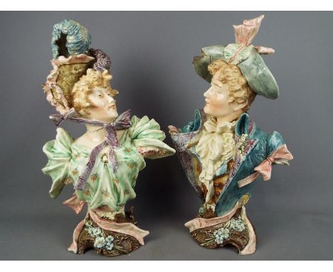 Two large ceramic busts in the style of Ernst Wahliss, a lady and a gentleman impressed marks '2053' and '2054' to the base, 