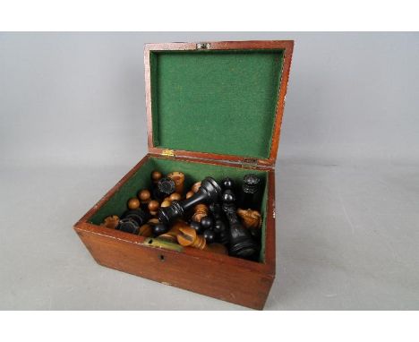 Jaques &amp; Son of London - a Staunton pattern complete chess set, the weighted pieces in boxwood and ebony, the white king 