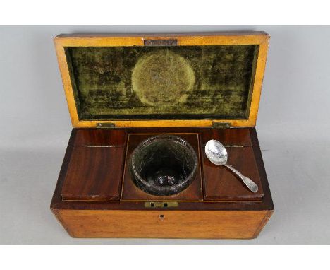 An early 19th century tea caddy, the interior fitted with two subsidiary caddies and mixing bowl, approximately 15 cm x 32 cm