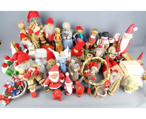 A collection of traditional Christmas decorations to include Swedish straw, ceramic, wooden and similar. 