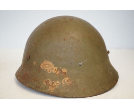 WWII Imperial Japanese Army Helmet with Japanese Calligraphy.
WWll imperial Japanese army helmet , military Green , Star has 