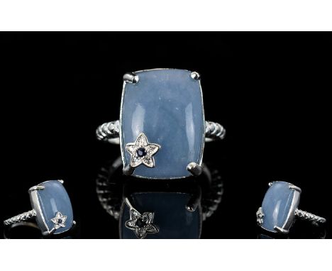 Angelite Statement Ring with sapphire set star accent, 12cts of the unusual stone, angelite, mined in Mexico, in a single elo