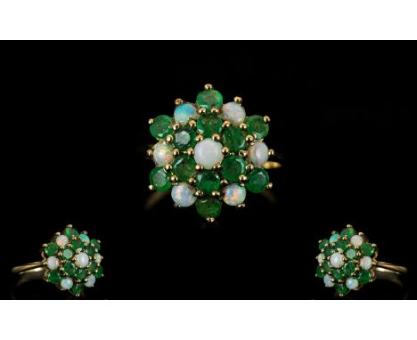 Ladies 9ct Gold - Attractive Opal and Emerald Dress Ring, Flower head Design. Fully Hallmarked for 9.3753. 3.4 grams. Ring Si