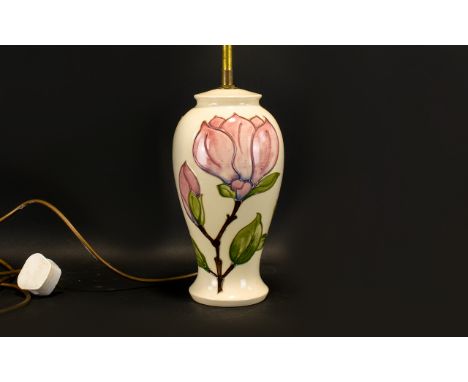 Moorcroft Magnolia Design Lamp Base Baluster form lamp, cream ceramic ground with pink tubelined magnolia flowers and green f