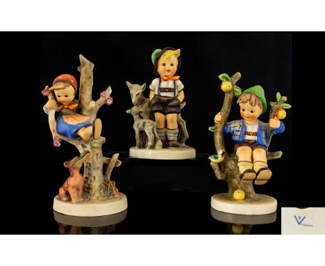 M J Hummel Handpainted Figures (3) Three.1. Apple Tree Boy 6.25" - 15.60 cm.2. Girl Up A Tree, Dog with shoe. 6.75" - 17 cm.3