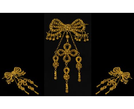 A 14ct Gold Victorian Ribbon Pendant Brooch Bow form filigree brooch, the ties set with miniature circular drops, the centre 