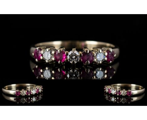 18ct Gold Seven Stone Ruby and Diamond Set Dress Ring, The Diamonds of Excellent Colour / Clarity. Est Diamond Weight 0.30 pt