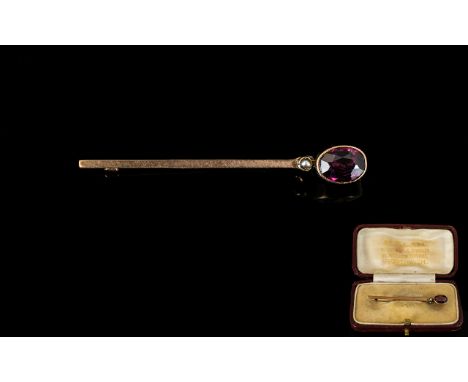 Victorian Period - Boxed 9ct Gold Amethyst and Seed Pearl Stick Pin. The Amethyst of Good Colour, Oval Shaped. Est 1.5 cts. 2
