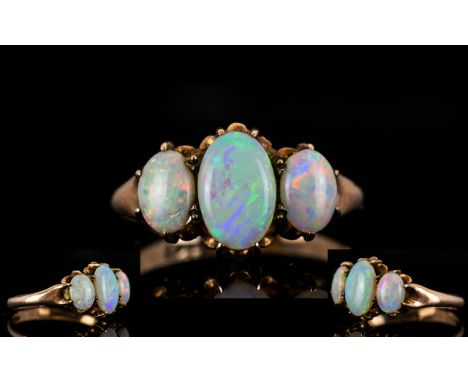 Antique Period 9ct Gold 3 Stone Opal Set Dress Ring, The 3 Opals of Excellent Colour, The Central Oval Shaped Opal of About 1