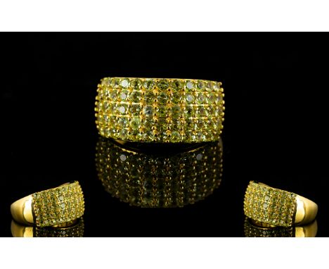 Peridot Five Row Band Ring, five rows of pave set, round cut peridots totalling 2.25cts, in a wide band of 14ct gold vermeil 
