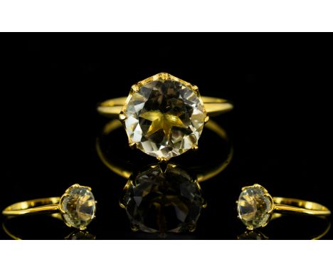 Green Amethyst Solitaire Ring, a round cut, 3.5ct green amethyst held in an openwork goblet shape mount, set on a plain shank