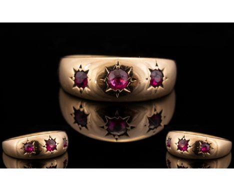 Antique Period 9ct Rose Gold 3 Stone Ruby Ring.  The rubies of good colour.  Ring size M.  3 Grams.  Please see photographs.