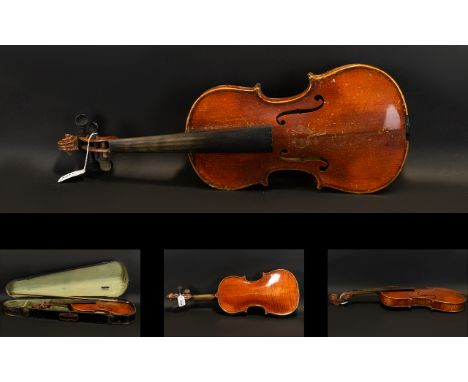 A Late 19th Early 20th Century Violin Two piece back, along with bow and fitted case, back length 13 3/4 inches.