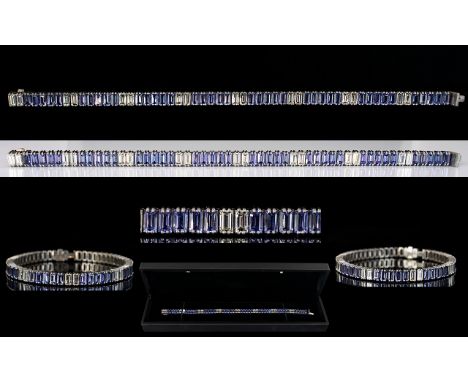 18ct White Gold Superb Emerald Cut Diamond &amp; Tanzanite Link Bracelet.  The 16 Emerald Cut Diamonds of excellent colour an