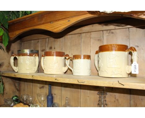 A SELECTION OF J PEARSON OF BLACKPOOL SERIES WARE, tyg and loving cups and a gilt metal ceiling light