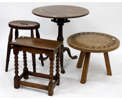 A CIRCULAR OAK TOPPED TRIPOD TABLE an elm country stool, an oak long stool on bobbin turned legs and a light oak circular car