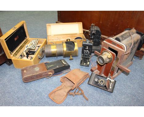 AN UNUSUAL LACQUERED BRASS LANTERN OR COLOURSCOPE REFLECTOR together with a magic lantern projector by Reynolds and Branson L