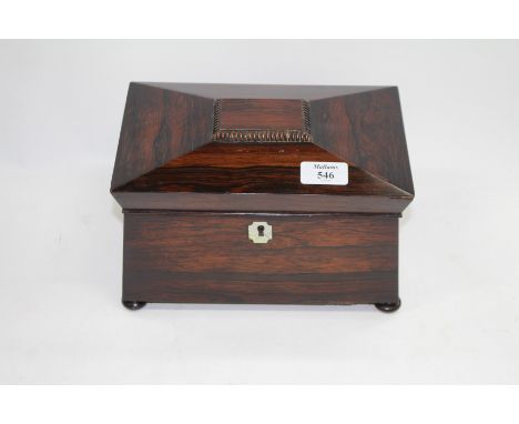 A VICTORIAN ROSEWOOD TEA CADDY of sarcophagus form with two compartments within, 24cm wide 