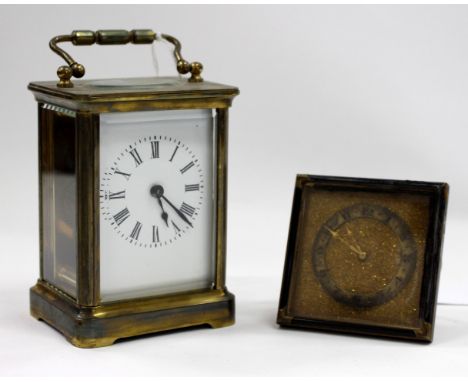 A 19TH CENTURY BRASS CASED CARRIAGE CLOCK with white enamel dial with black painted Roman numerals, possibly French, 14cm wit