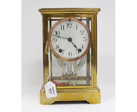 A BRASS CASED AMERICAN ANSONIA FOUR GLASS MANTLE CLOCK, the enamelled dial with Arabic numerals, the movement striking the ho