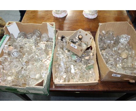 A LARGE COLLECTION OF DECANTER STOPPERS
