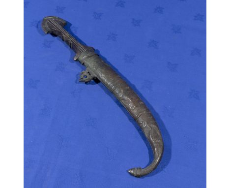 A Middle Eastern brass dagger and scabbard