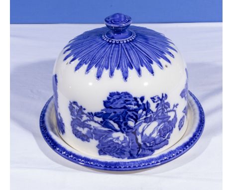 A large blue and white ceramic cheese dome
