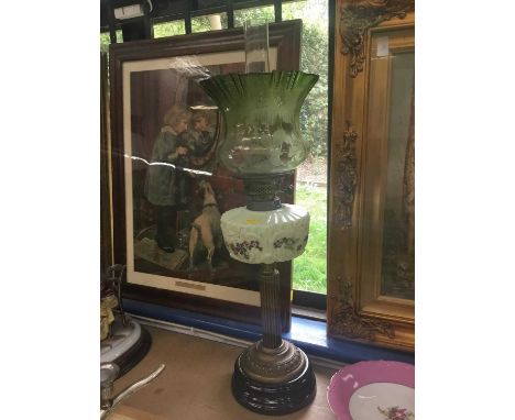 Late Victorian brass oil lamp with green glass shadeShade is in good condition with no chips or cracks