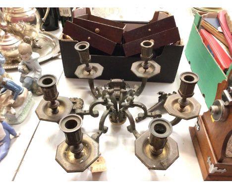 Six branch brass light fitting and six wooden cabinet draws