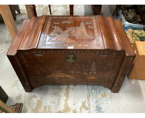 Good quality Oriental camphor wood trunk with carved decoration, 90cm wide, 46cm deep, 54cm high