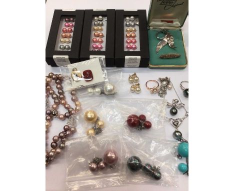 Three boxed sets of coloured pearl stud earrings, necklace and earring sets and sundry jewellery