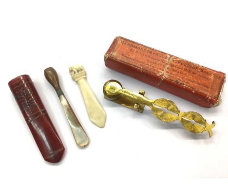 Set of Harrison's brass sovereign scales in box, two cheroot holders and ivory bookmark