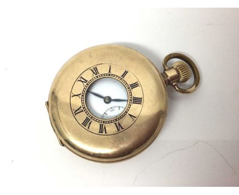 Gold plated half hunter pocket watchThe watch winds and ticks but we cannot guarantee the accuracy of its time keeping.&nbsp;