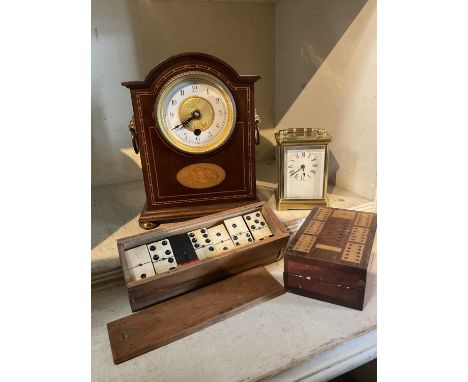 Brass carriage clock and Edwardian mantle clock (replacement quartz movement) together with a set of bone and ebony dominoes 