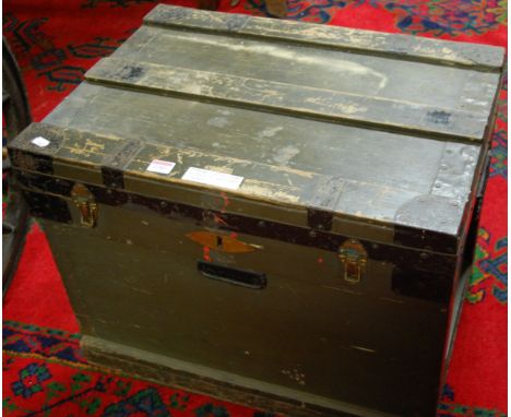 A circa 1900 painted pine and metal bound binge top military trunk, having zinc lined interior with removable trays, titled '