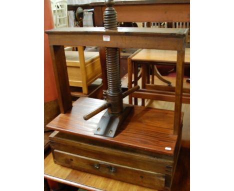 A 19th century fruitwood bookpress having replacement panel and single long lower drawer