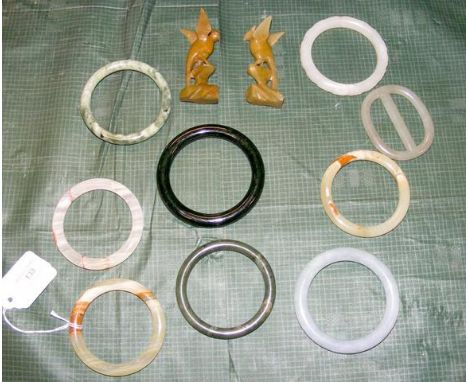 Selection of jade bangles, ornaments, etc.CONDITION REPORT&nbsp;one bangle has crack across as per image, other either crack 