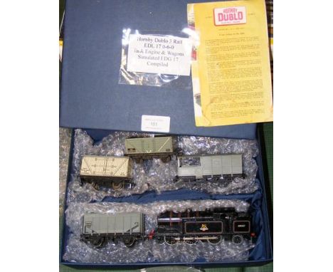 A Hornby Dublo 3 Rail Tank Engine and four goods wagons 