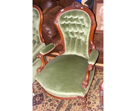 A Victorian button back easy chair 