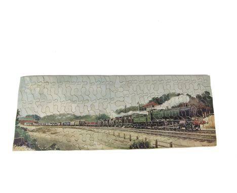 A Chad Valley GWR Jigsaw ‘Freight Train’, showing a GWR Freight Train hauled by 2-8-0 Locomotive No 2861, passing a Signal Bo